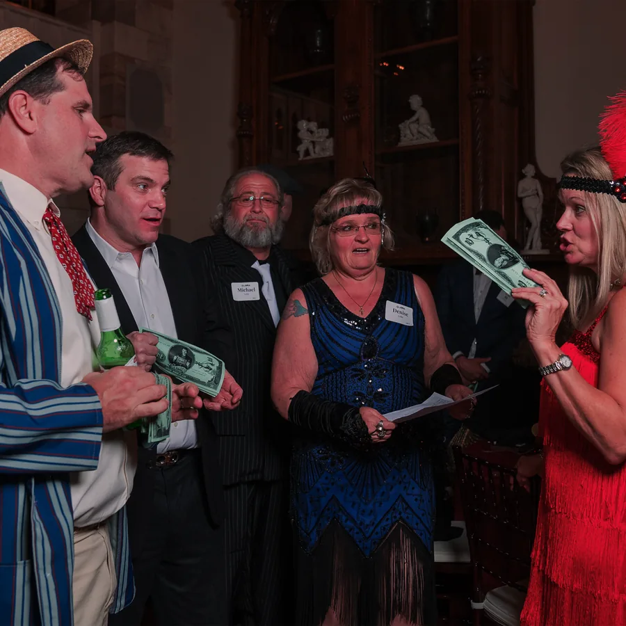 Guests at a Murder Mystery Company public dinner show in Grand Rapids
